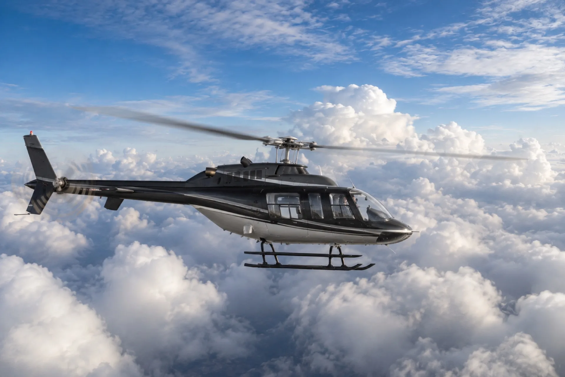 Helicopter flying above the clouds